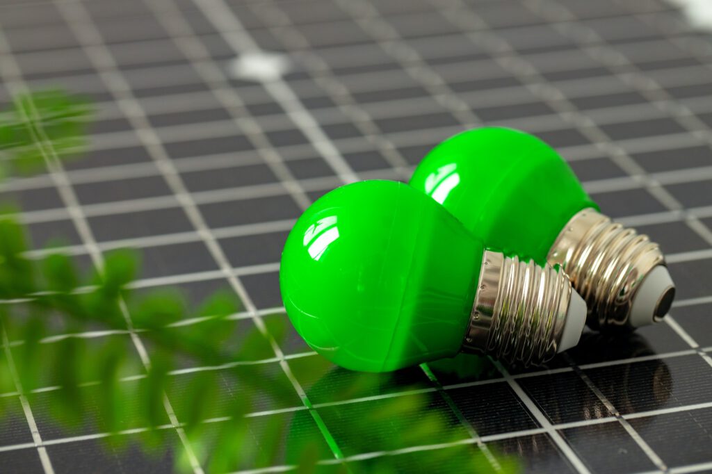 Solar energy panel and light bulb, green energy